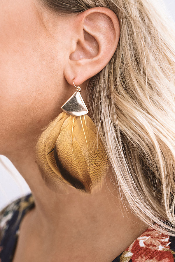 Feeling Flirtatious Feather Earrings In Mustard