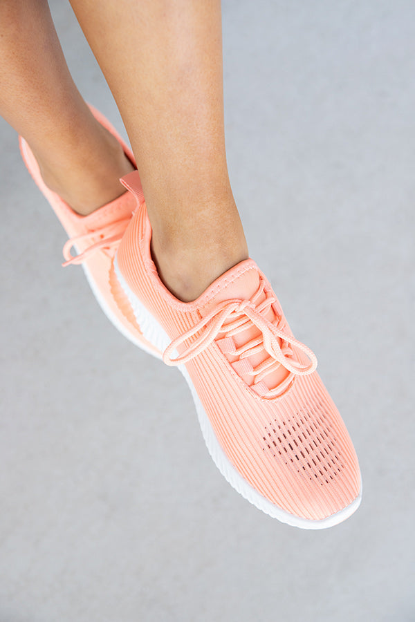 neon coral sneakers