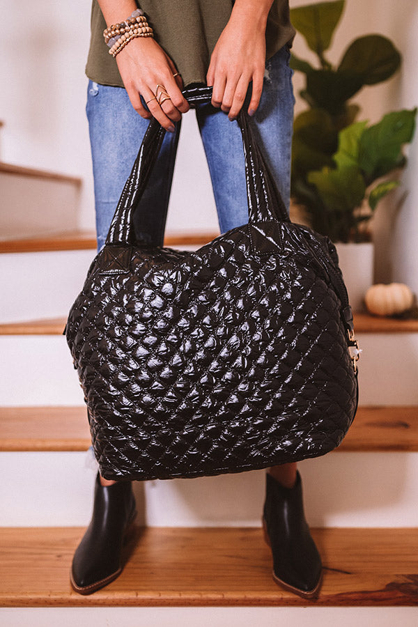 large black quilted tote bag