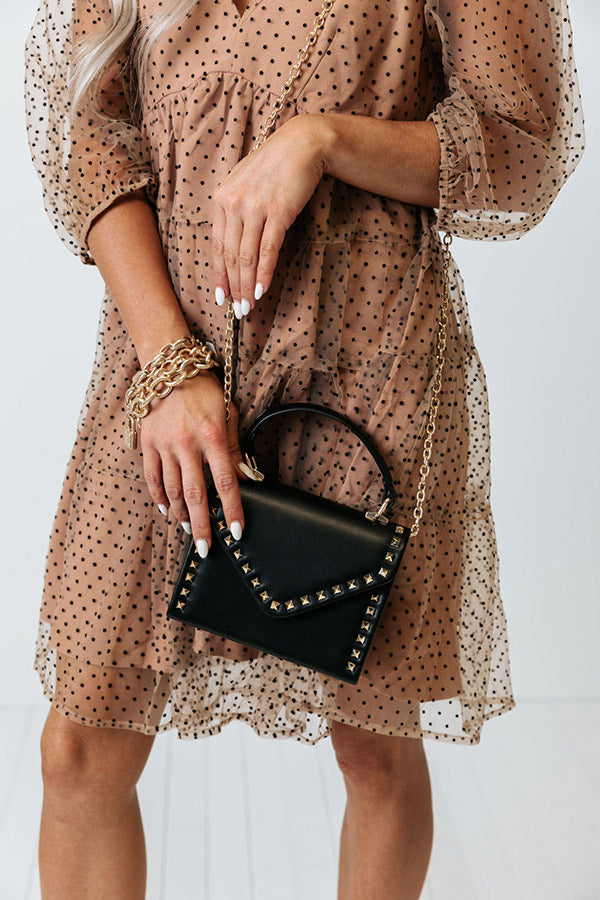 Close up fashion woman legs in short black dress with black handbag... -  Stock Image - Everypixel