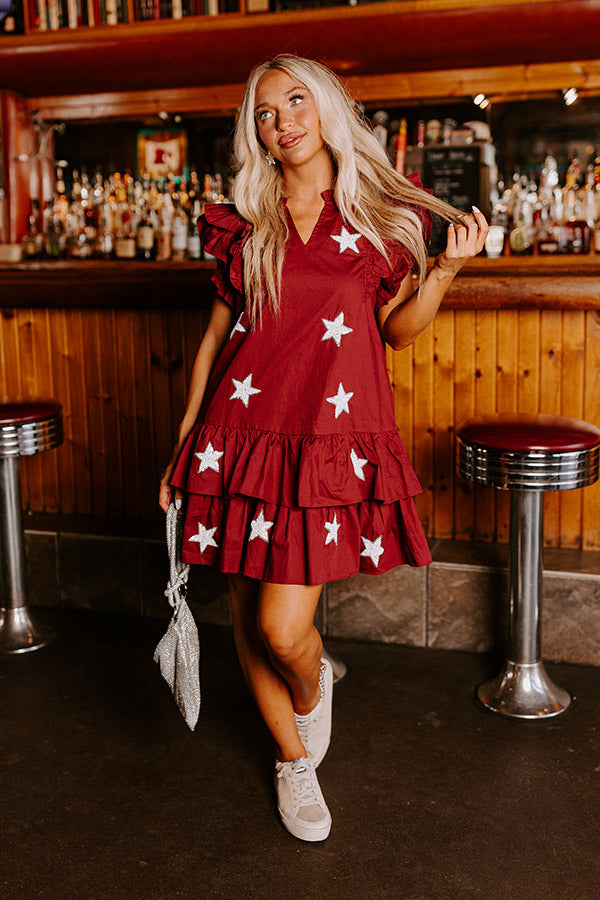 Under The Stadium Lights Ruffle Mini Dress in Maroon