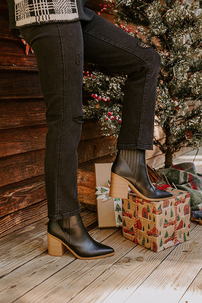 Accessorize flat ankle boots in black faux suede