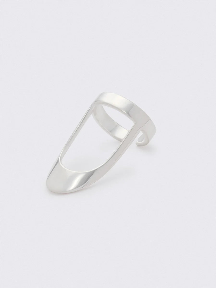 A ring that sits on the end of a finger that resembles a fingernail. It includes an area that covers the free edge of the wearer's fingernail.