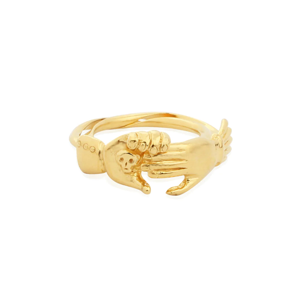 A gold ring in the form of a pair of hands which may be separated to reveal a tiny skull as a reminder of one's mortality.