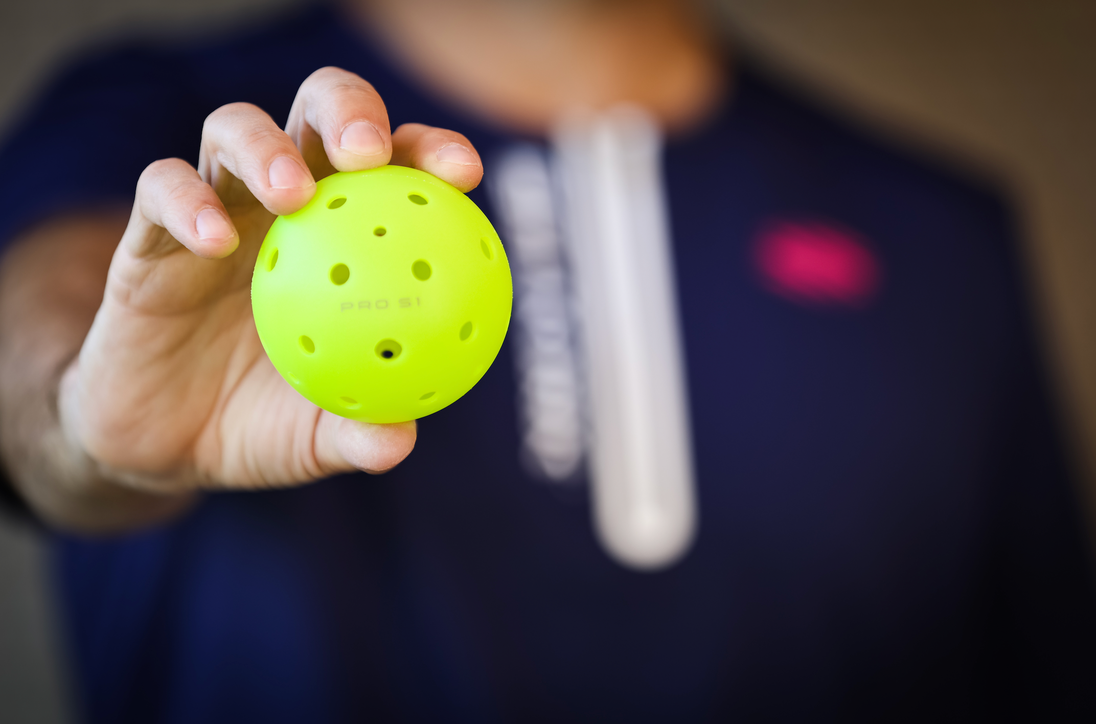 The Pro S1 pickleball features a 38 hole pattern