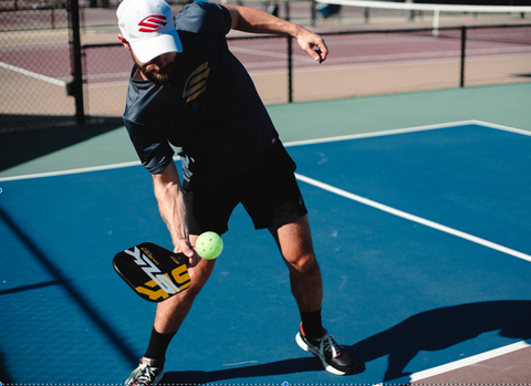 Wear a hat for sun protection on the pickleball court
