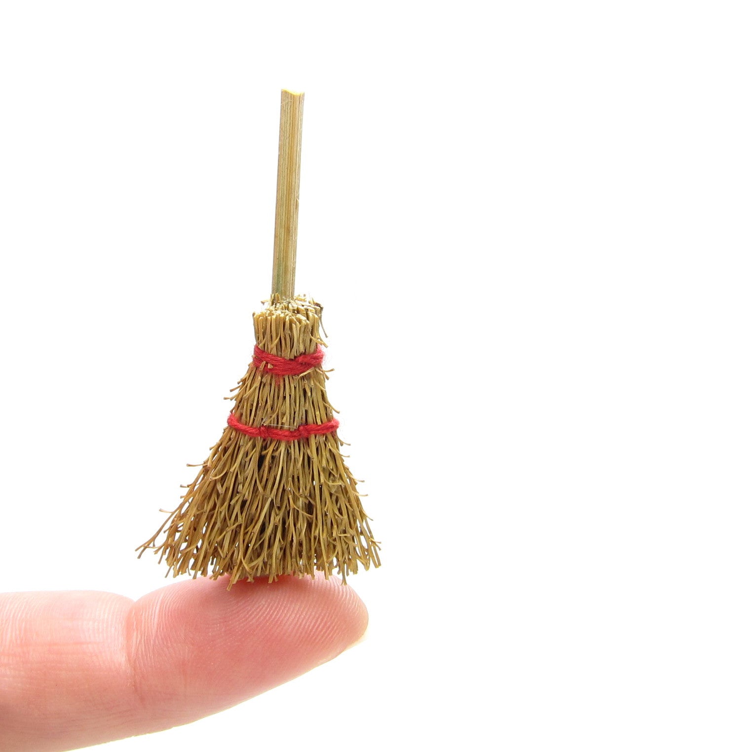 small wooden broom