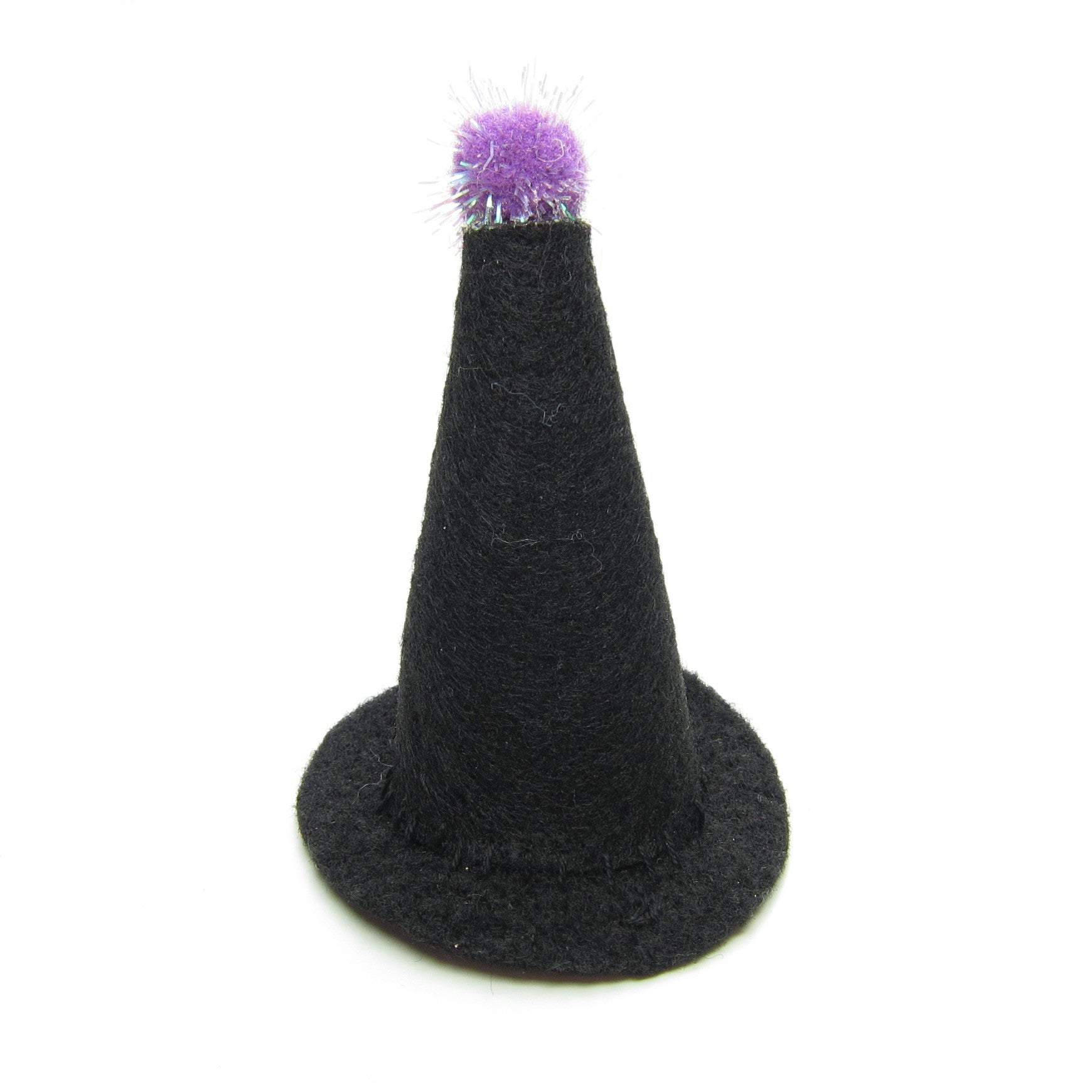 woman wearing tiny witch hat