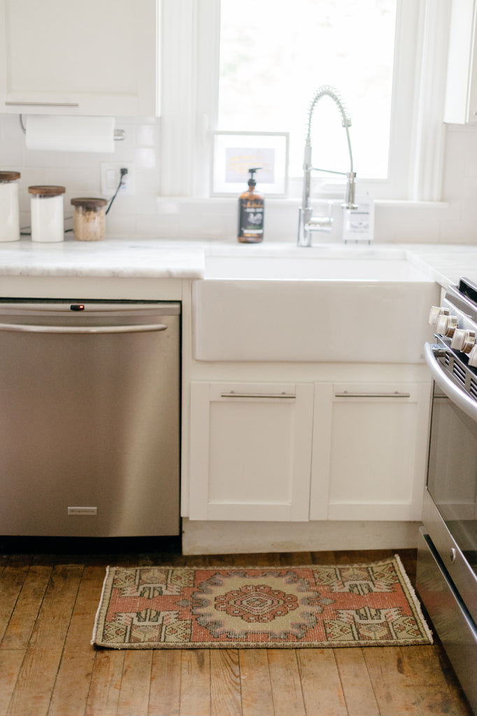 A small vintage rug in the kitchen