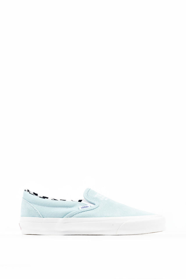 pastel blue vans slip ons