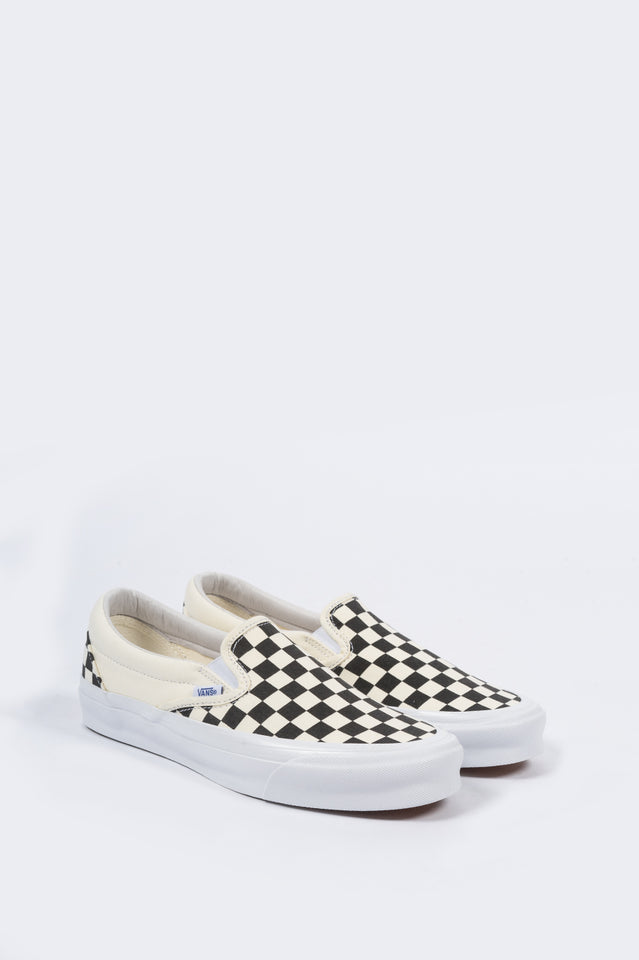 checkerboard white vans