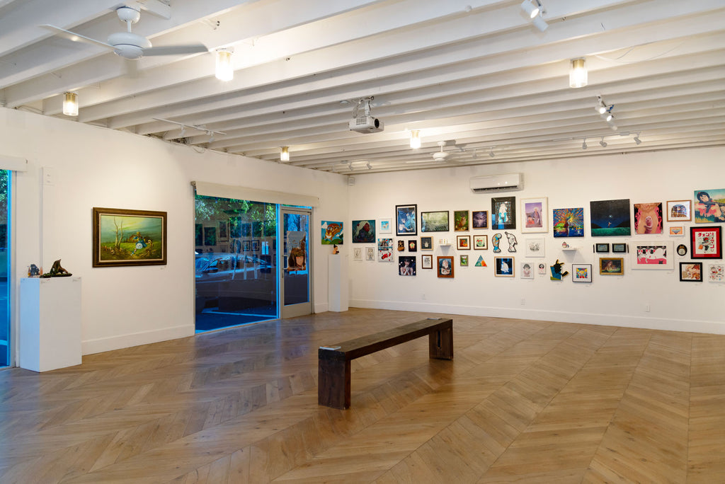 View of exhibition space and original artwork from the show