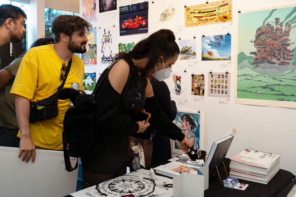 Visitors checking out merchandise from Anime in LA