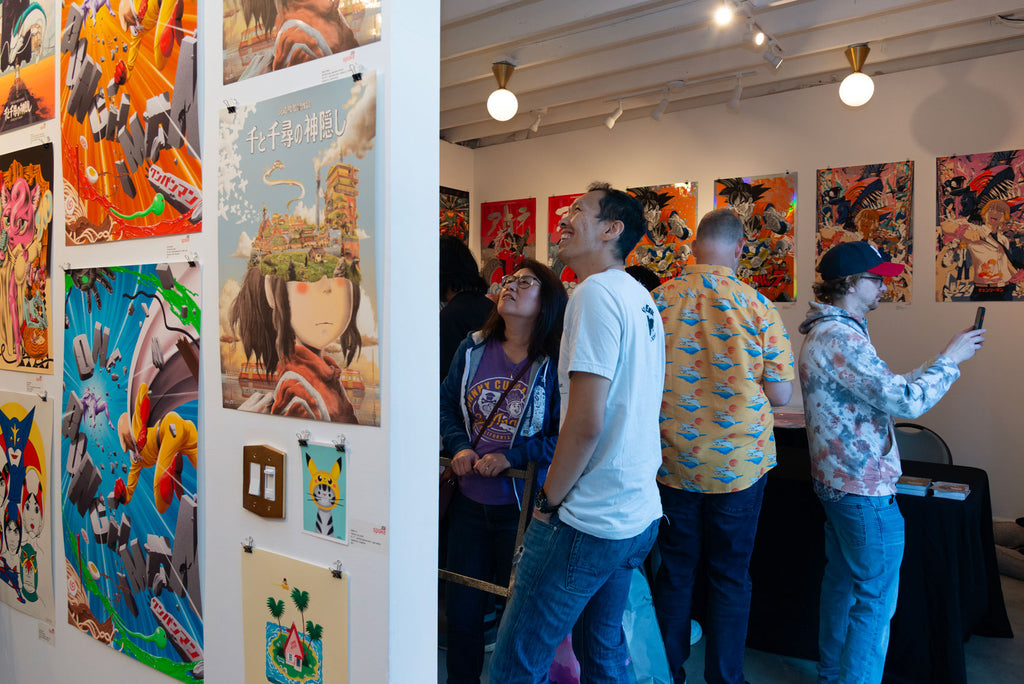 Visitors viewing the limited edition artwork from Anime in LA
