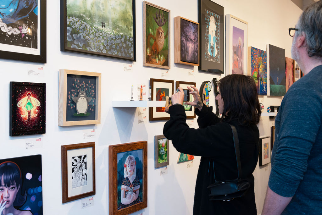 Visitors photographing Hoang Tran's crayon sculptures