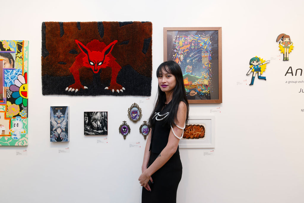 Artist Jeany Ngo in front of her "Kurama" tufted wool artwork