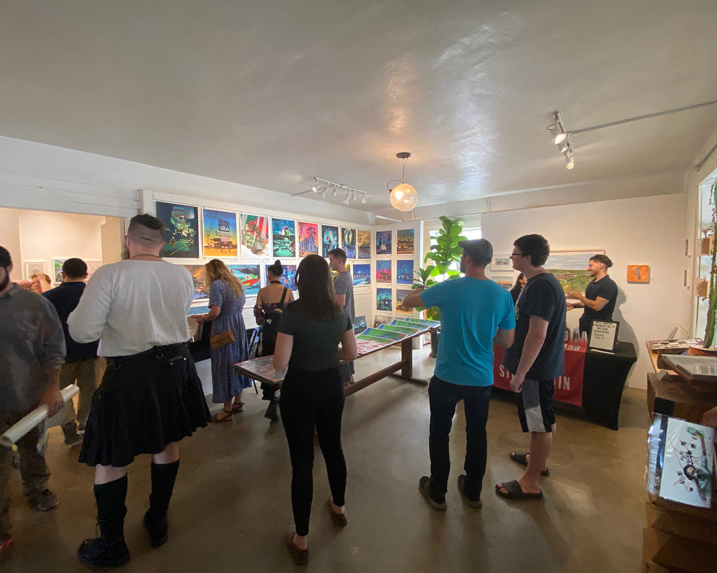 Guests at Tim Doyle's UnReal Estate X opening in Austin, TX