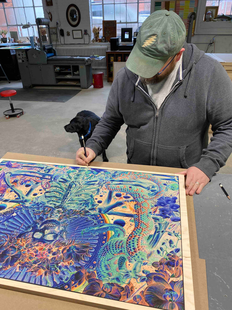 AJ Masthay signing Through the Veil wood panel print edition