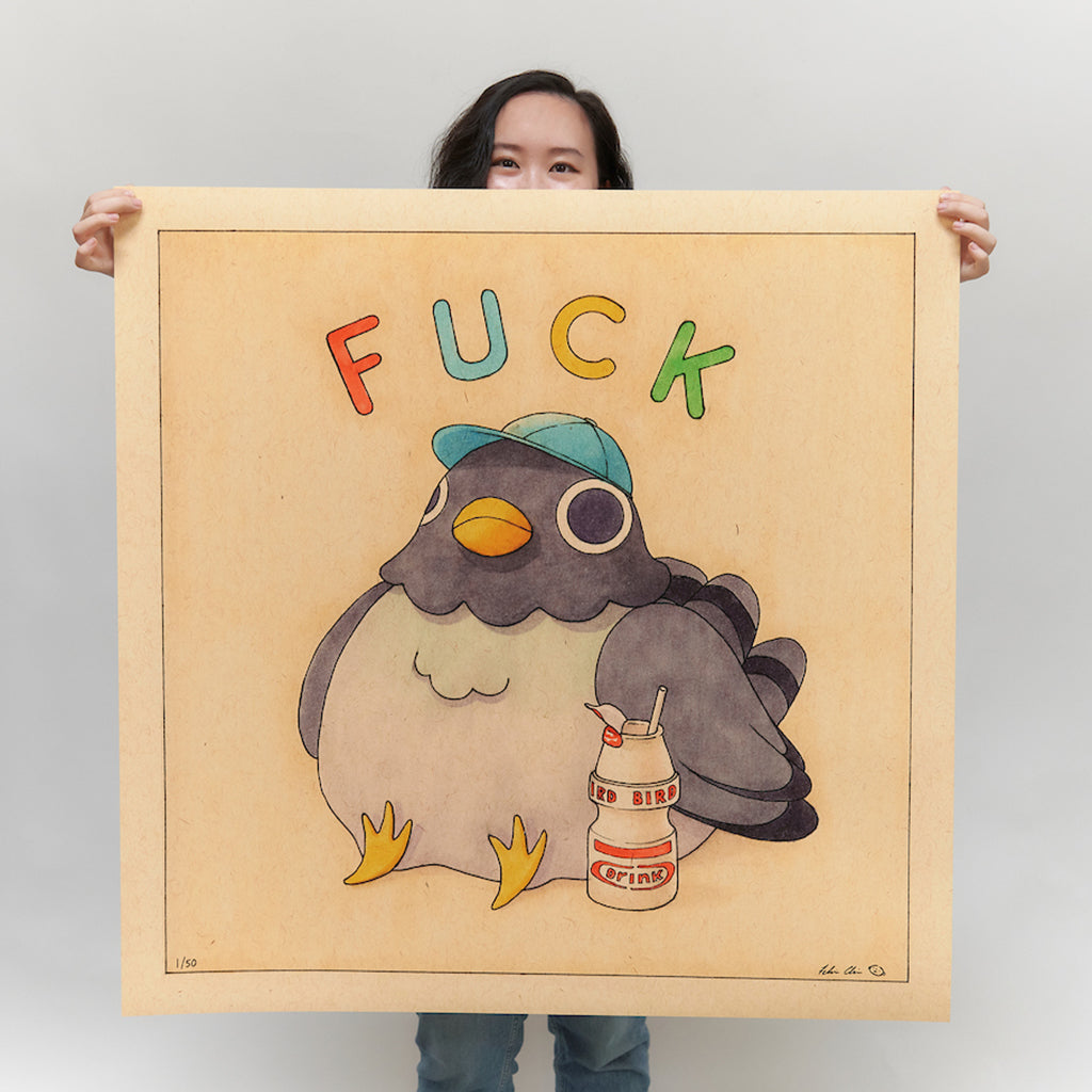 Artist Felicia Chiao holding her Fuck Pigeon with Yakult print