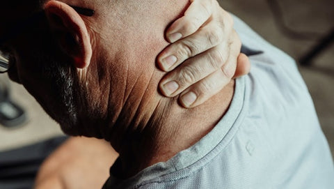 older man having neck pain