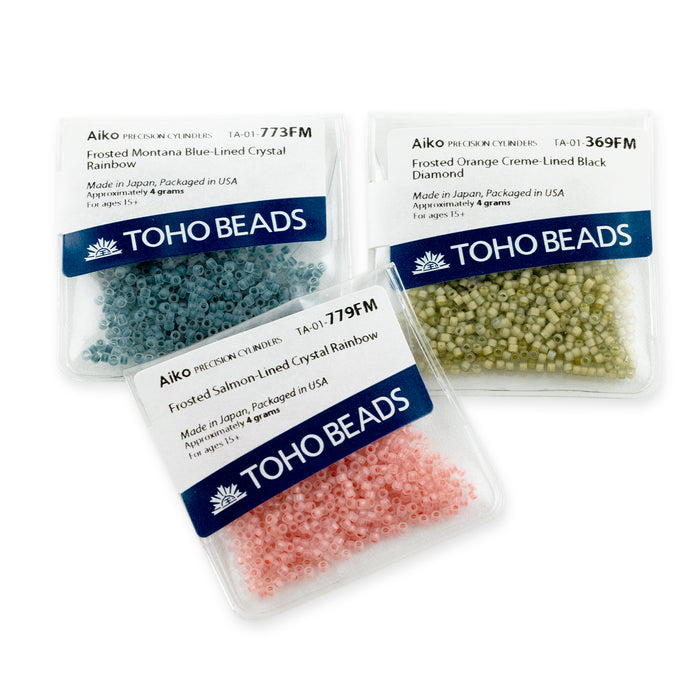 Toho Aiko Seed Beads, 11/0 #369FM 'Frosted Orange Creme-Lined Black Diamond' (4 Grams)