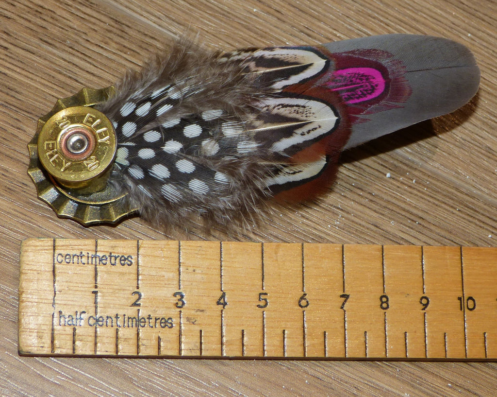 cartridge feather brooch