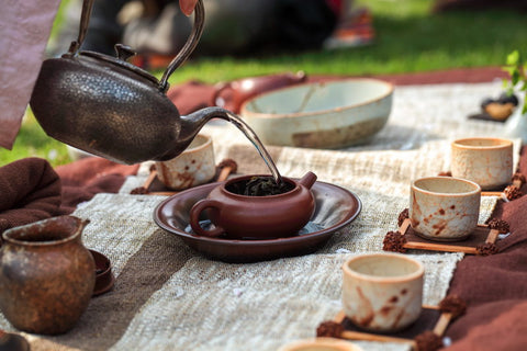 Samurai warriors gather together to drink tea