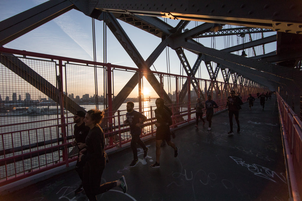 Group of runners on an easy run on the Williamsburg bridge