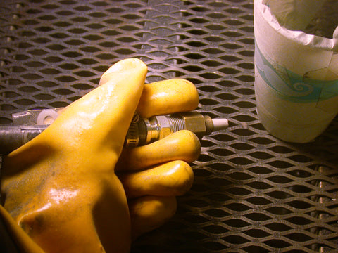 sandblasting nozzle inside a cabinet