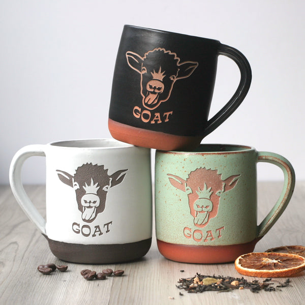 three handmade engraved goat mugs