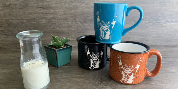 Stretch Cat mugs