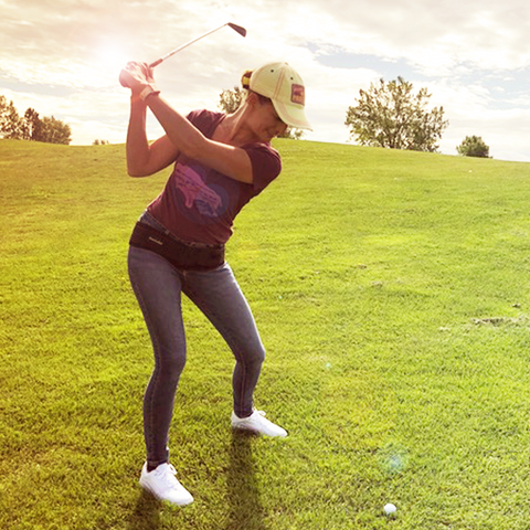 Woman wearing an SI Joint Belt to prevent excessive movement by stabilizing and compressing the hips and pelvic area to reduce nerve inflammation and sciatica pain.