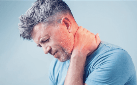 Man suffering from neck pain