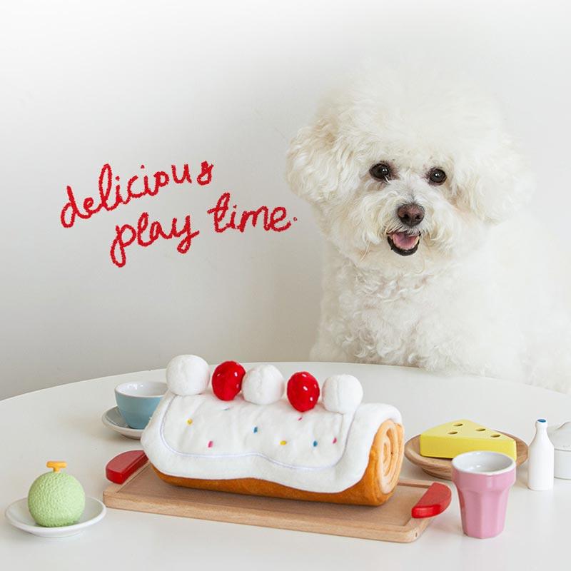 https://cdn.shopify.com/s/files/1/0154/8632/0688/products/bite-me-roll-cake-nose-work-dog-toy-672801.jpg?v=1603678454&width=800