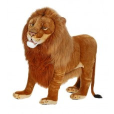 luke the lion shown standing in a golden brown color