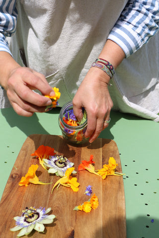 preparing tincture, place the flowers inside the container