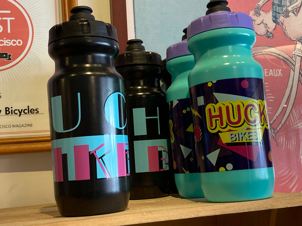 https://cdn.shopify.com/s/files/1/0155/3037/products/Huckbottles1_grande.jpg?v=1613099616