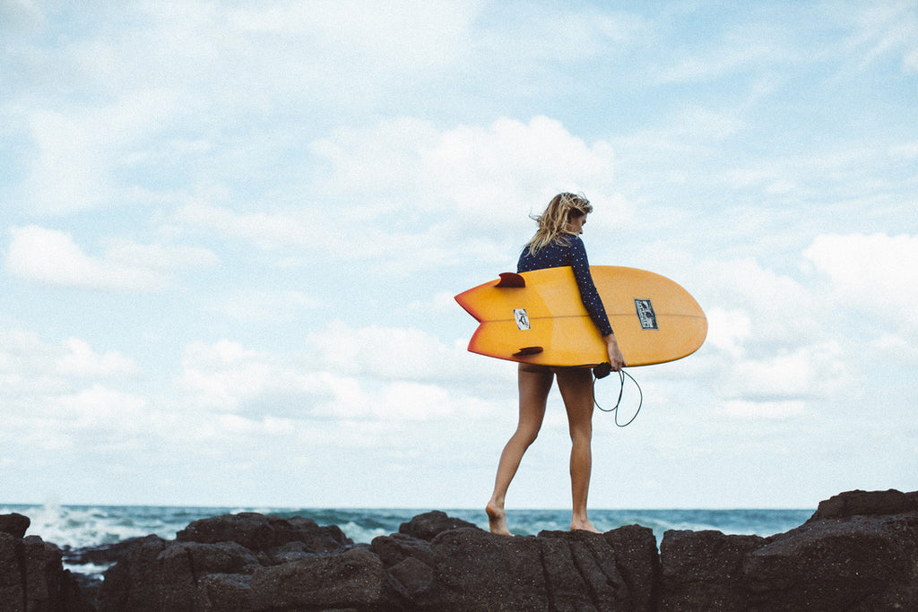 Montana Lower wears Salt Gypsy sustainable ocean activewear. The Navy & Gold Collection 2017 | www.saltgypsy.com #saltgypsy #activewear #activeswim #beachactive #womenwhosurf #surf #sustainableswim