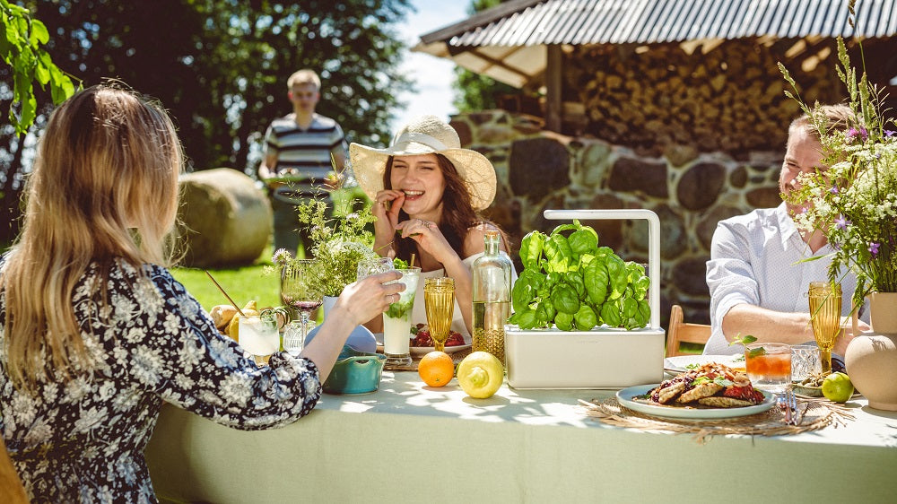 Garden party with the Smart Garden 3 on the table.