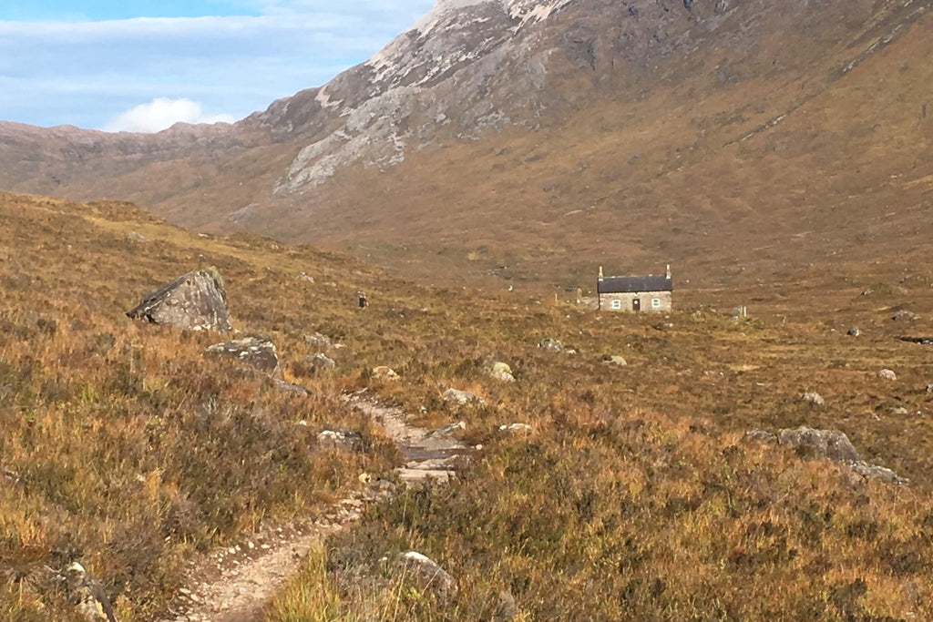 Coire Fionnaraich bothy beside single track mountain bike trail