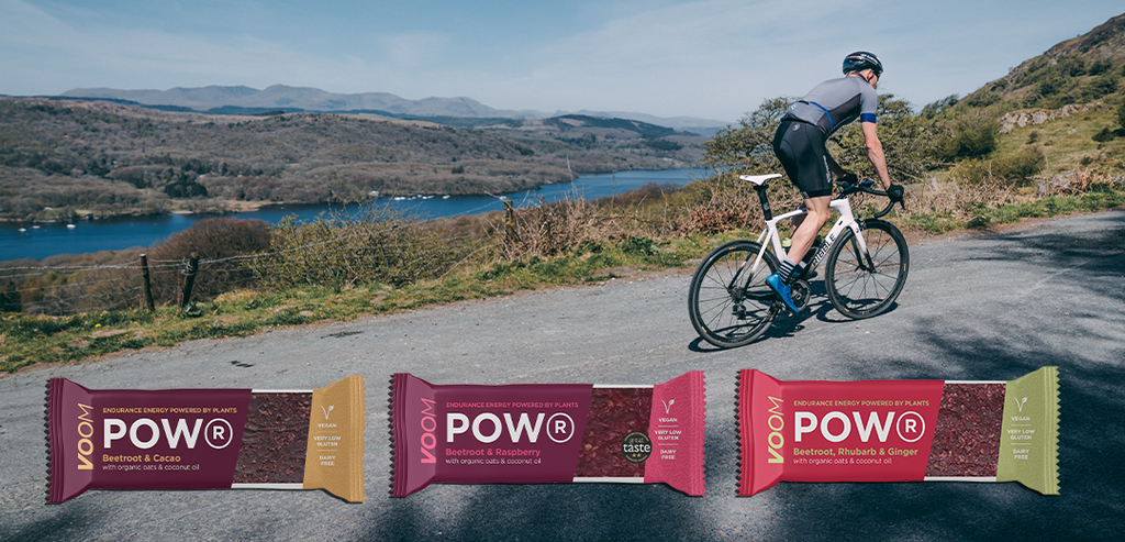 A cyclist heads up a steep hill after consuming nitrates in a VOOM beetroot bar