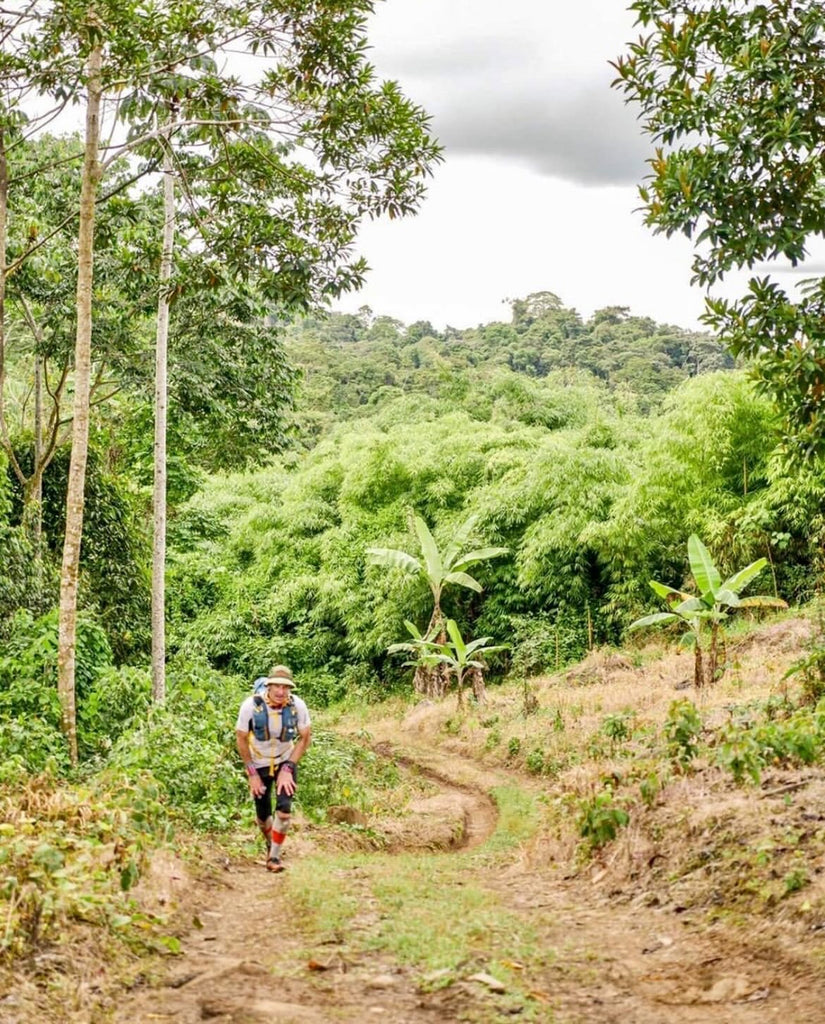 Running through the jungle on an uphill section during the Jungle Ultra 2022