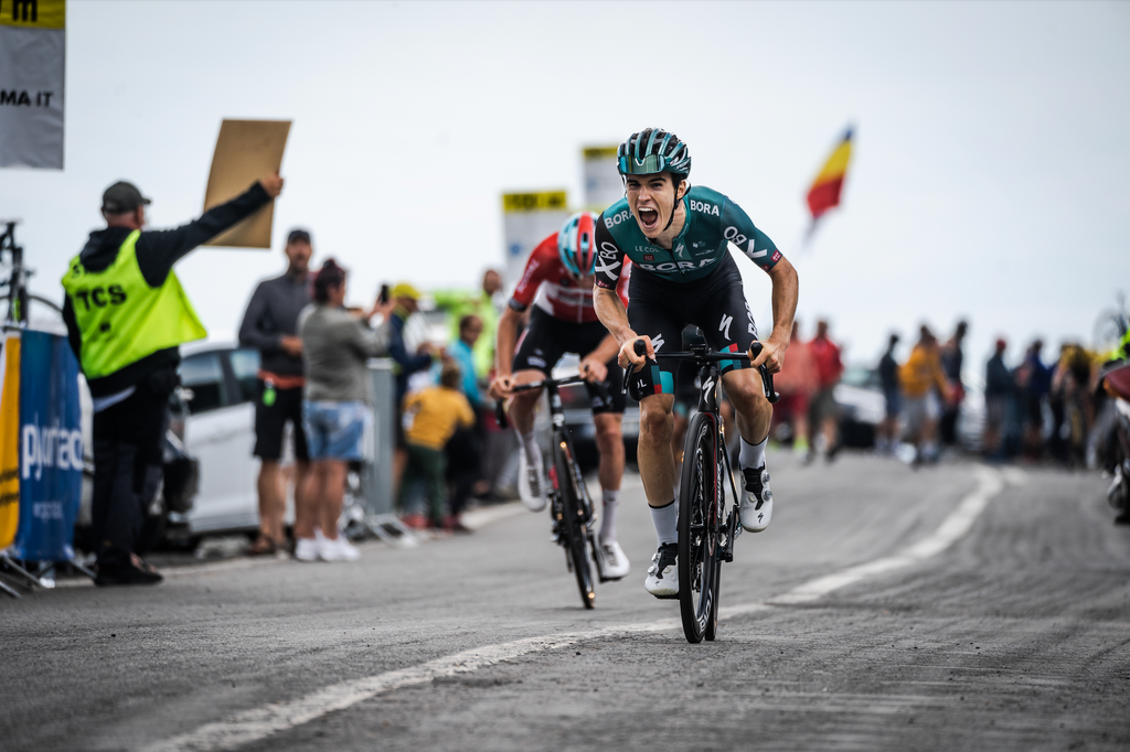 Bora Hansgrohe rider Giovanni Aleotti sprints to victory at the top of the Transfagarasan Road on Stage Two of the Sibiu Cycling Tour 2022