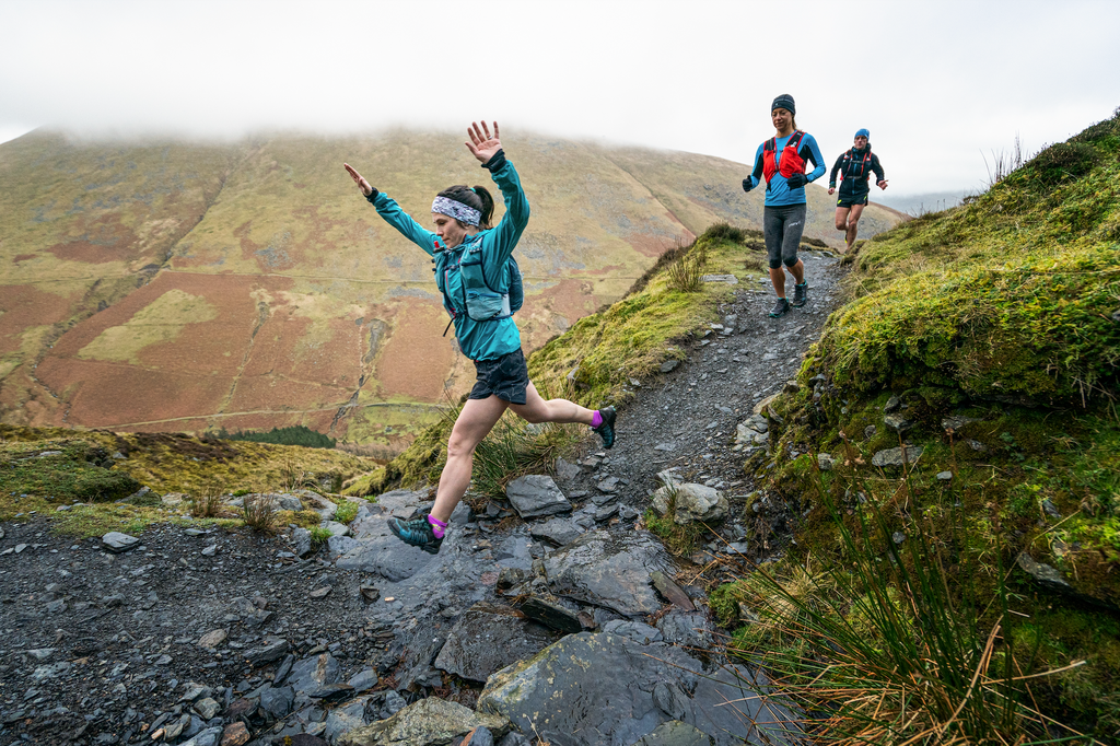 3 Runners enjoy a breathtaking descent whilst running in the Lake District