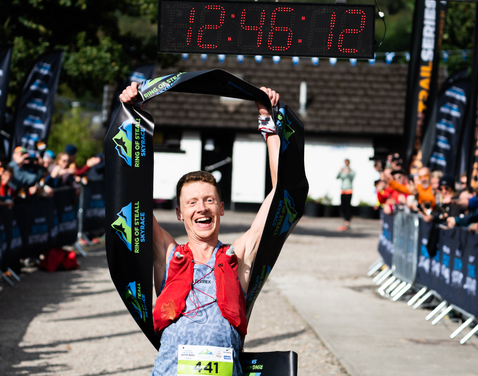 VOOM runner Gavin Dale takes the finishing tape winning the Ring of Steall Race at Skyline Scotland 2023