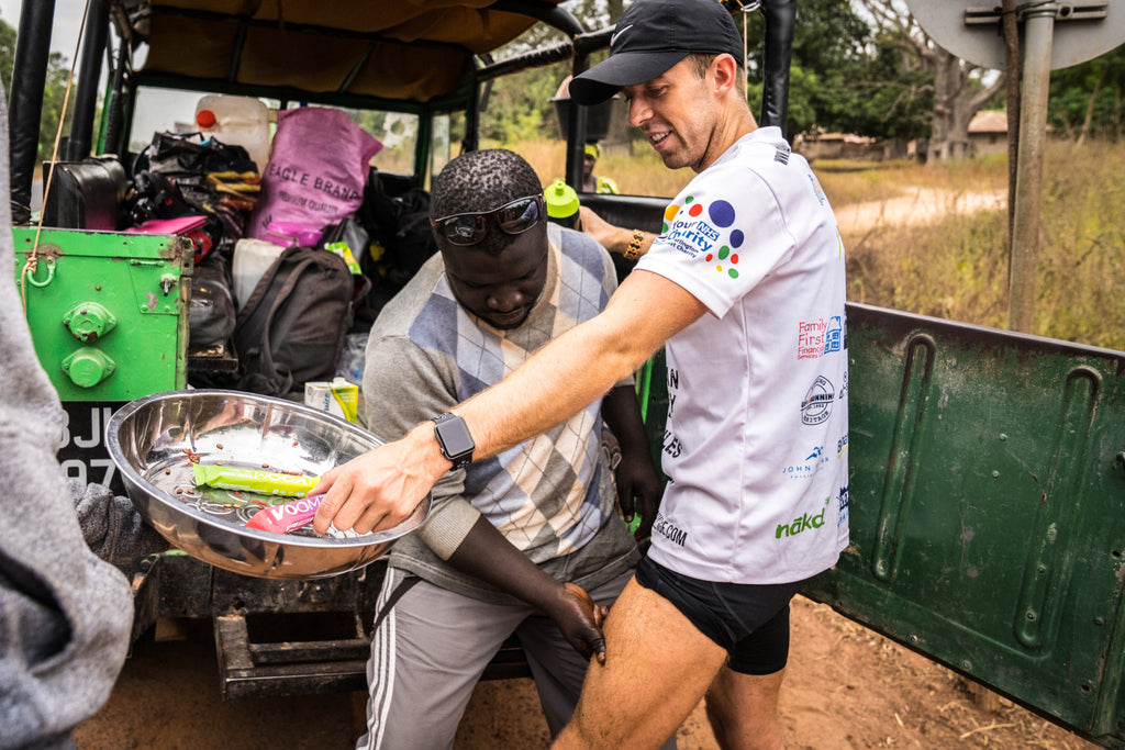 A runner receives massage during a long distance running event