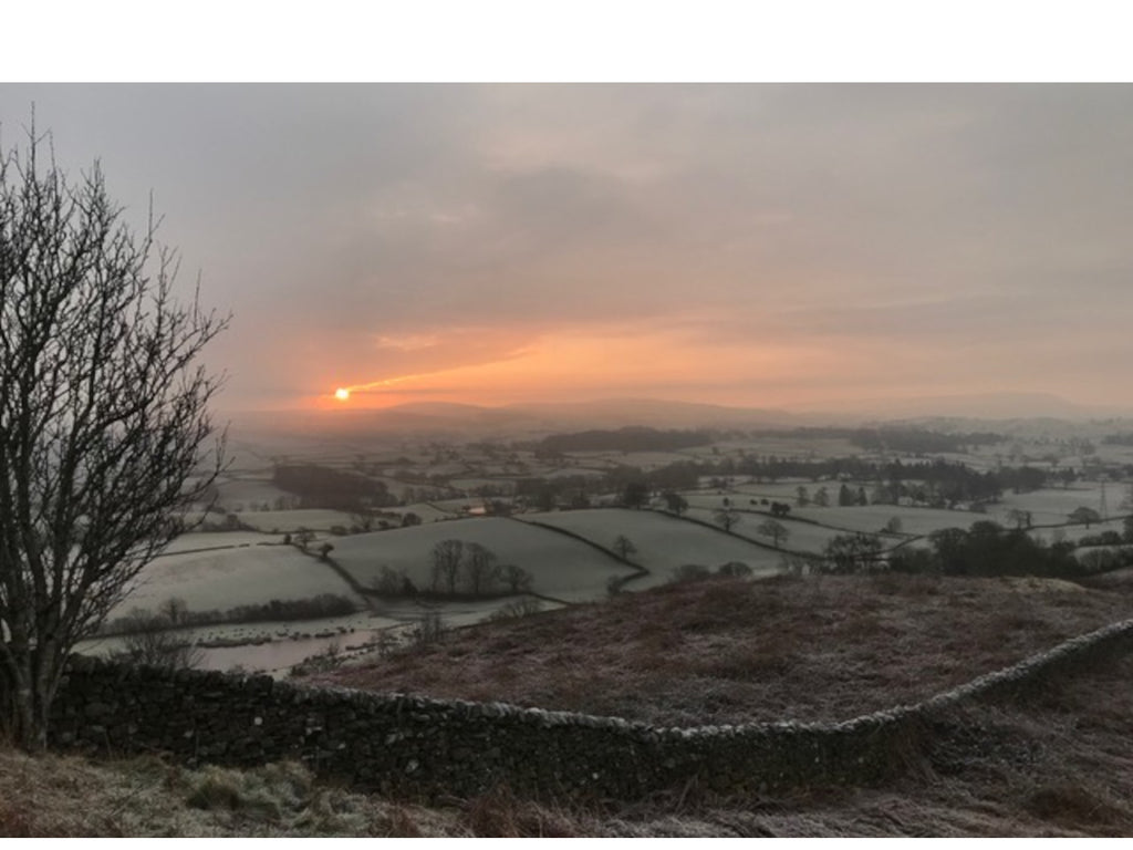 Sunrise over the countryside on a frosty, winter morning