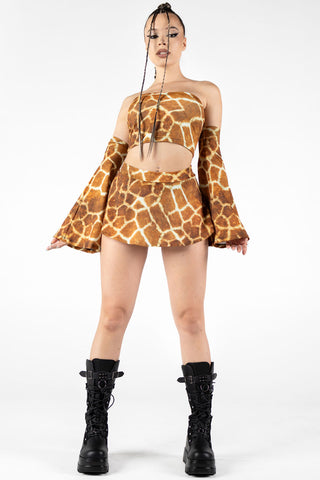 Sexy woman wearing a giraffe printed rave mini skirt set