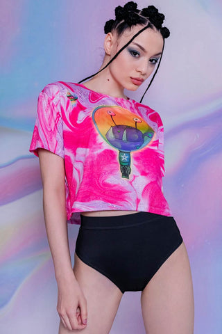 pink cropped tee with alien print and black booty shorts