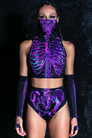 Sexy woman wearing a purple skeleton print booty shorts set